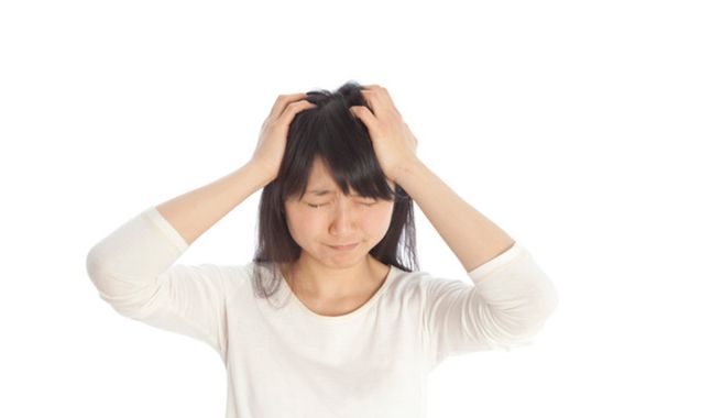 悩む